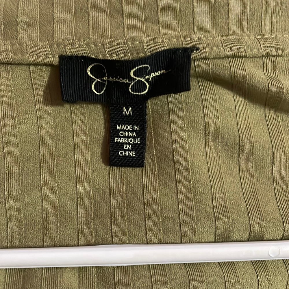 Jessica Simpson green top